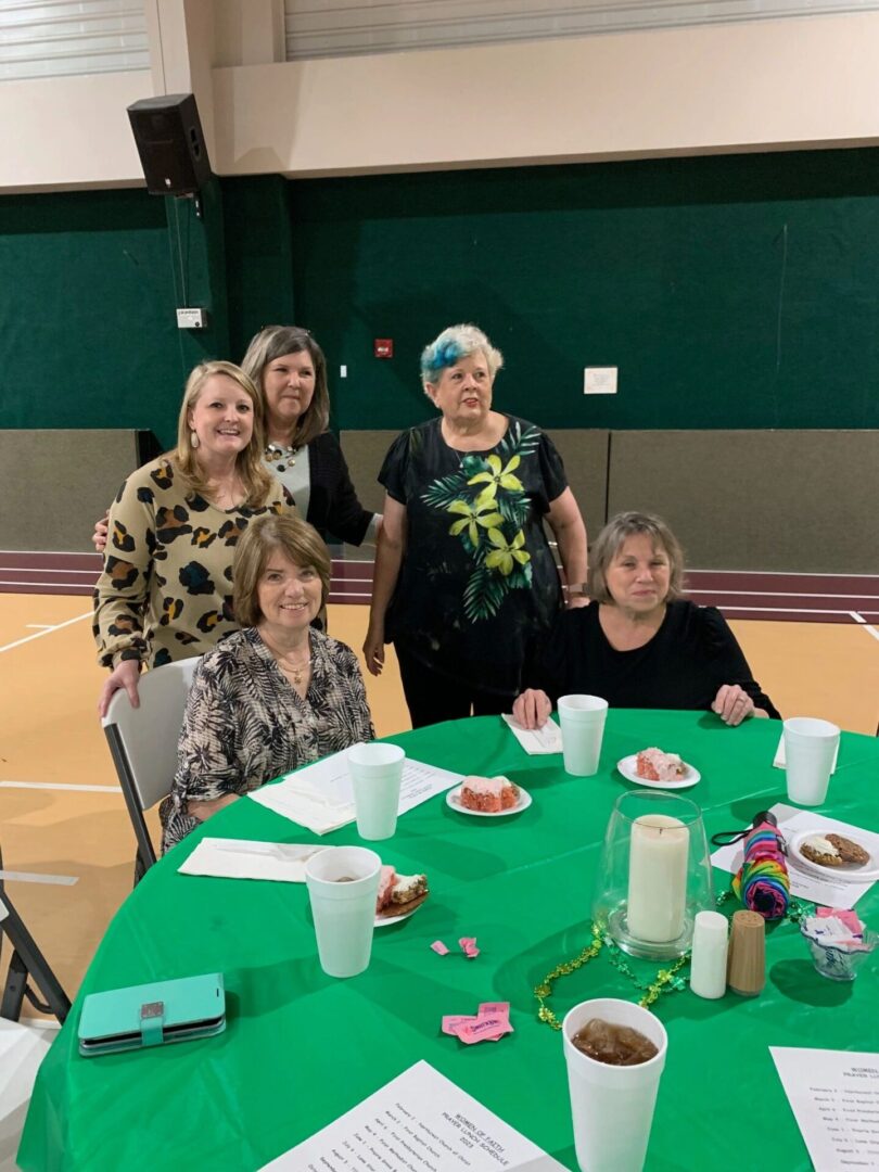 Pam, Staci, Amy, Leslie, and Wanda enjoying food and fellowship at the August Women of Faith luncheon.